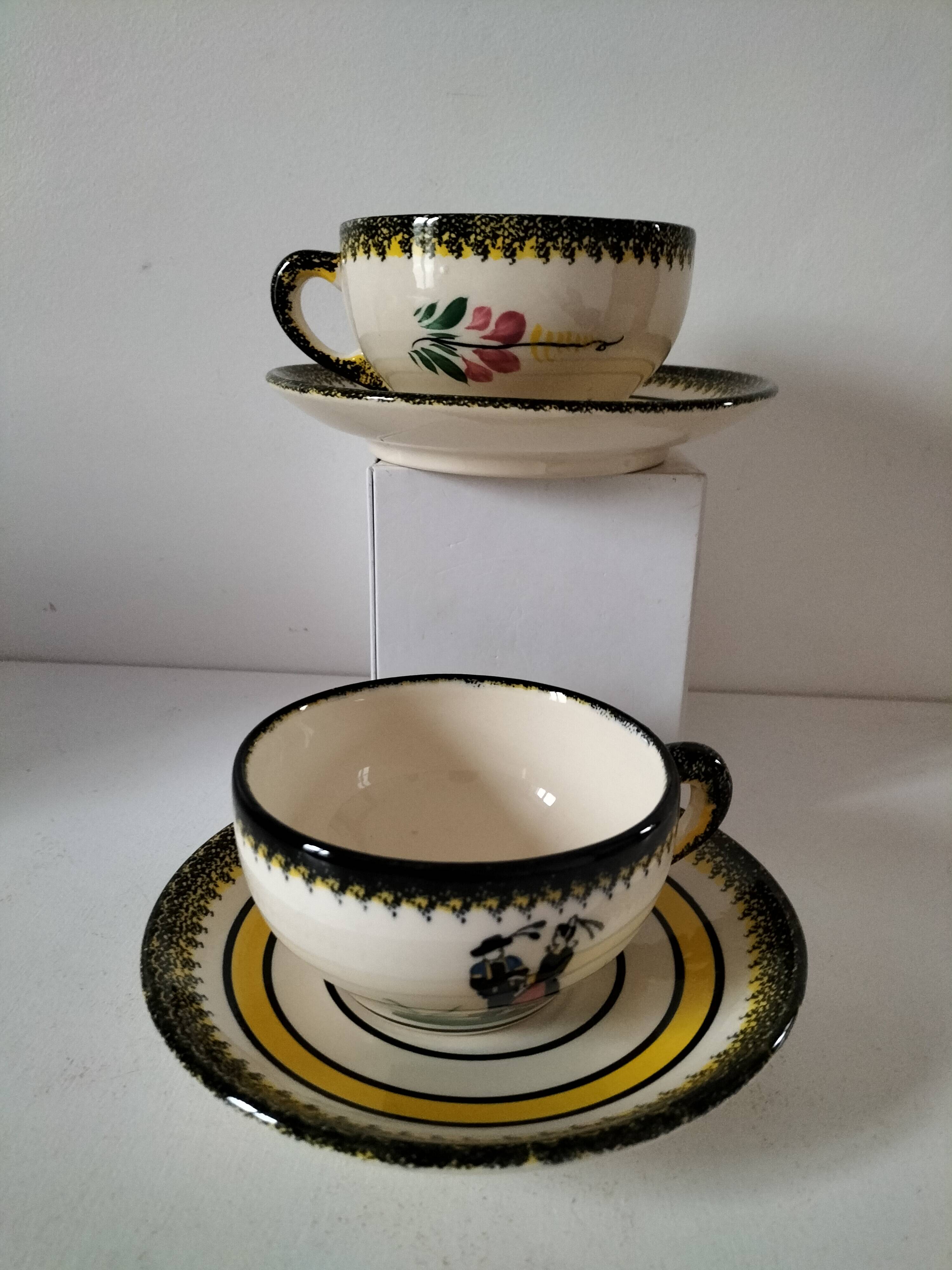 Two Henriot Quimper cups and saucers