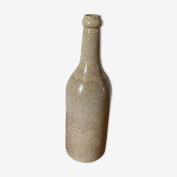 Bottle in light sandstone early twentieth century