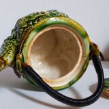 Set of old teapots and honey pot