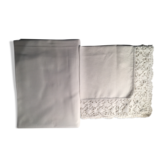 Old embroidered white linen and surnappe tablecloth