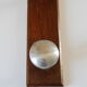 Wooden and stainless steel coat holders from the 1920s
