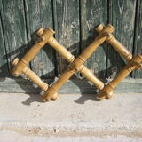Old accordion coat rack