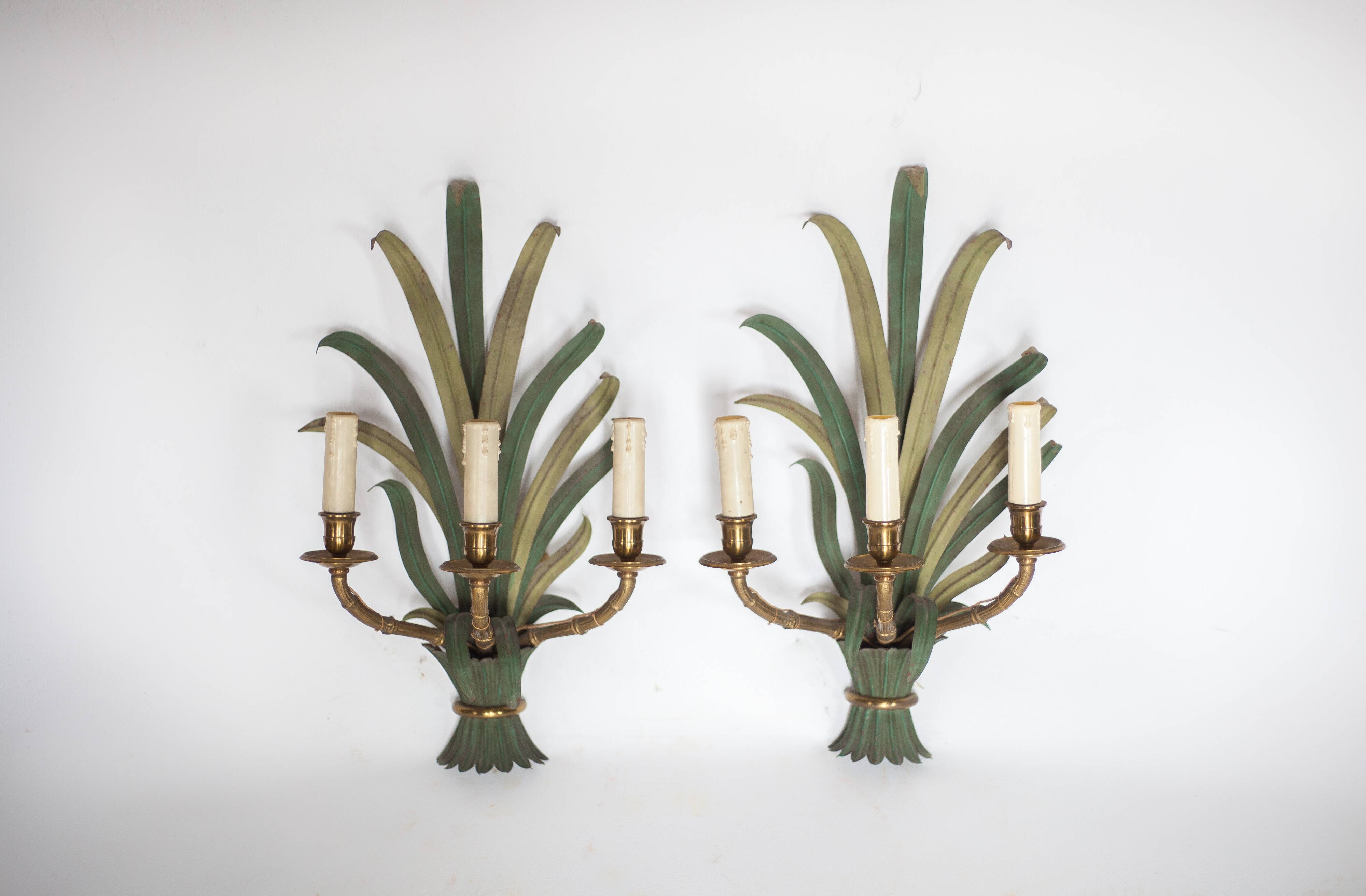 Pair of Maison Baguès wall lights with faux bamboo bronze and metal arms.