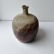 Ceramic ball vase by Anthony Pitot