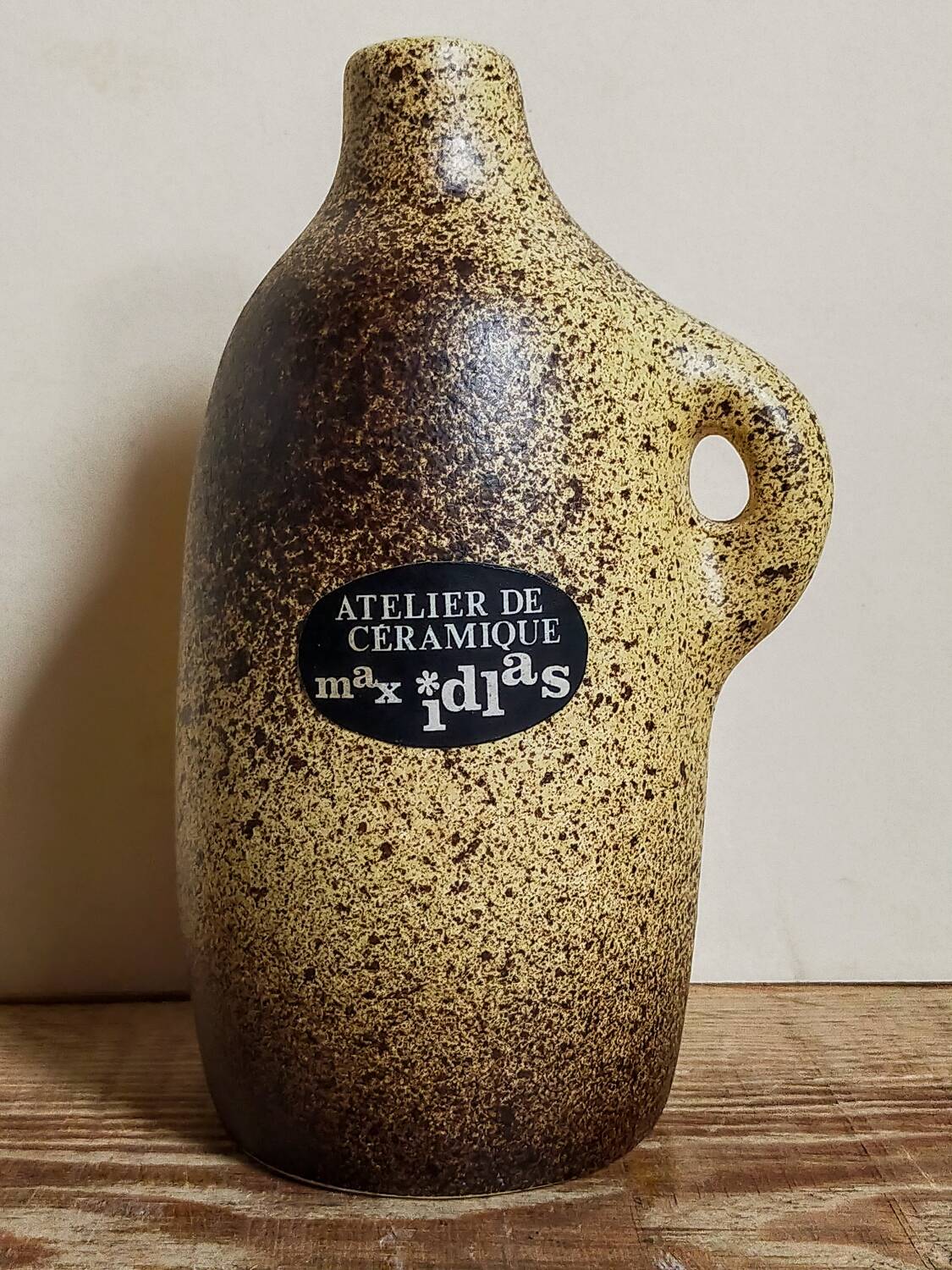 Single-flower vase, ceramic bottle by Max Idlas