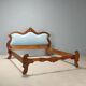 Antique Louis-Philippe bed in carved walnut, Italy, 19th century.