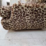 Vintage sofa in leopard fabric