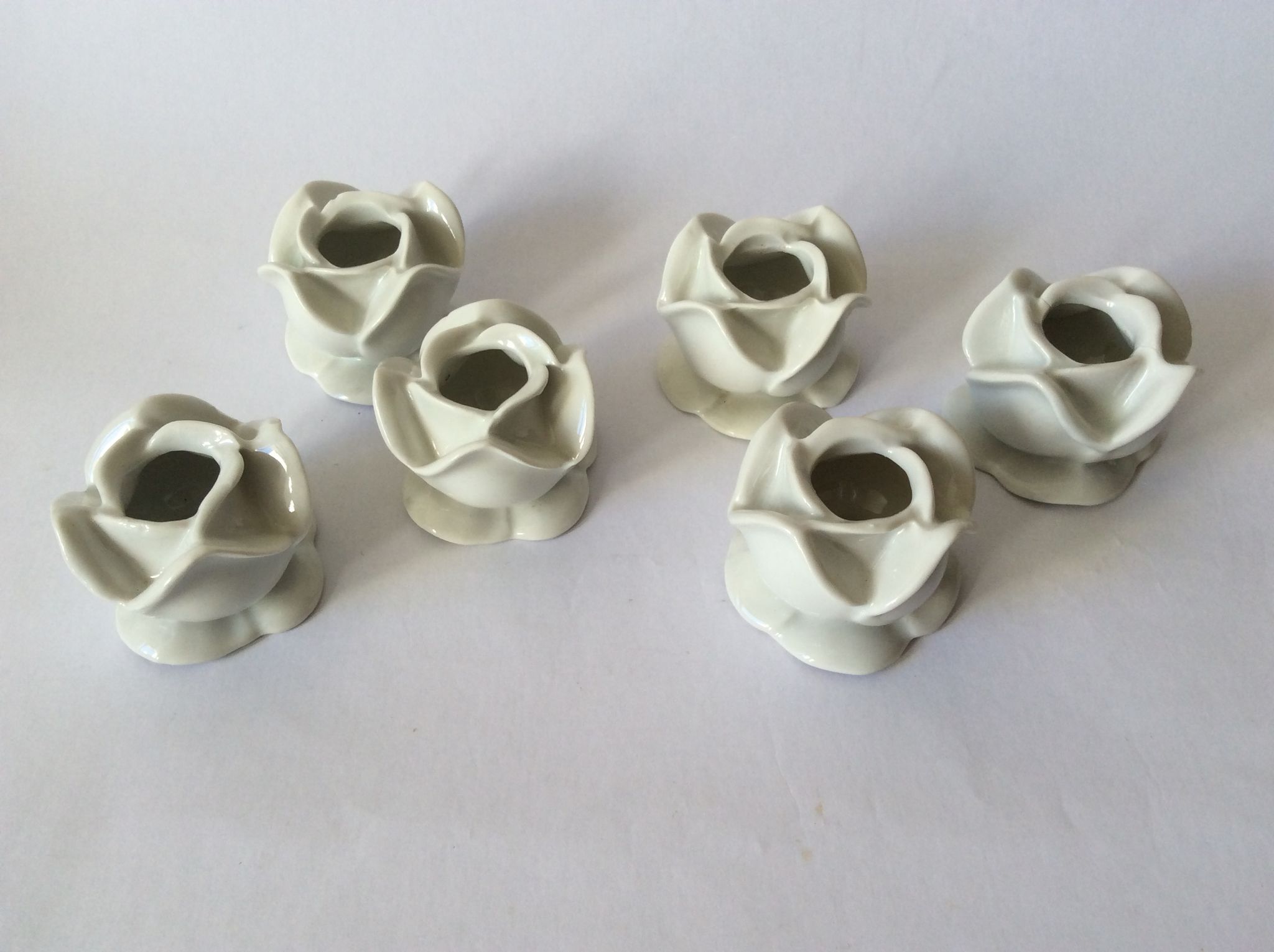 Lot de 6 bougeoirs rose en porcelaine blanche