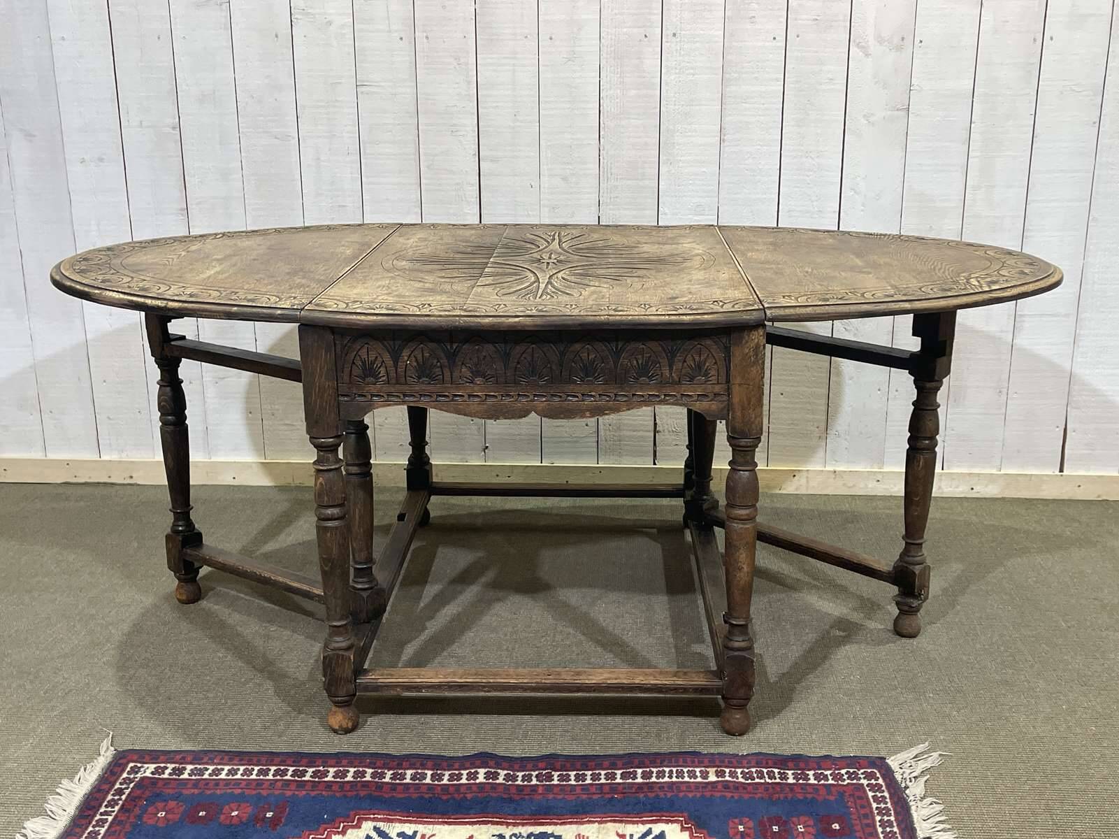English oak drop-leaf table from the early 20th century