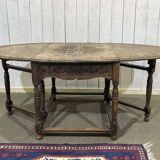 English oak drop-leaf table from the early 20th century