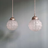 Pair of Art Deco frosted glass pendants, 1920s-30s.