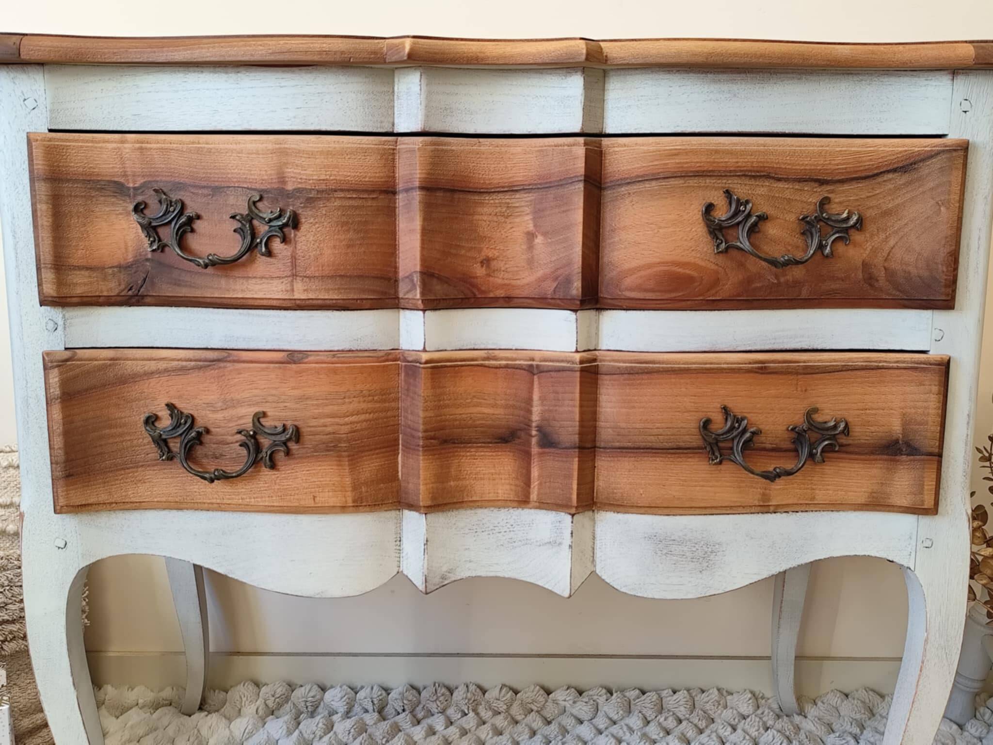 Walnut crossbow chest of drawers