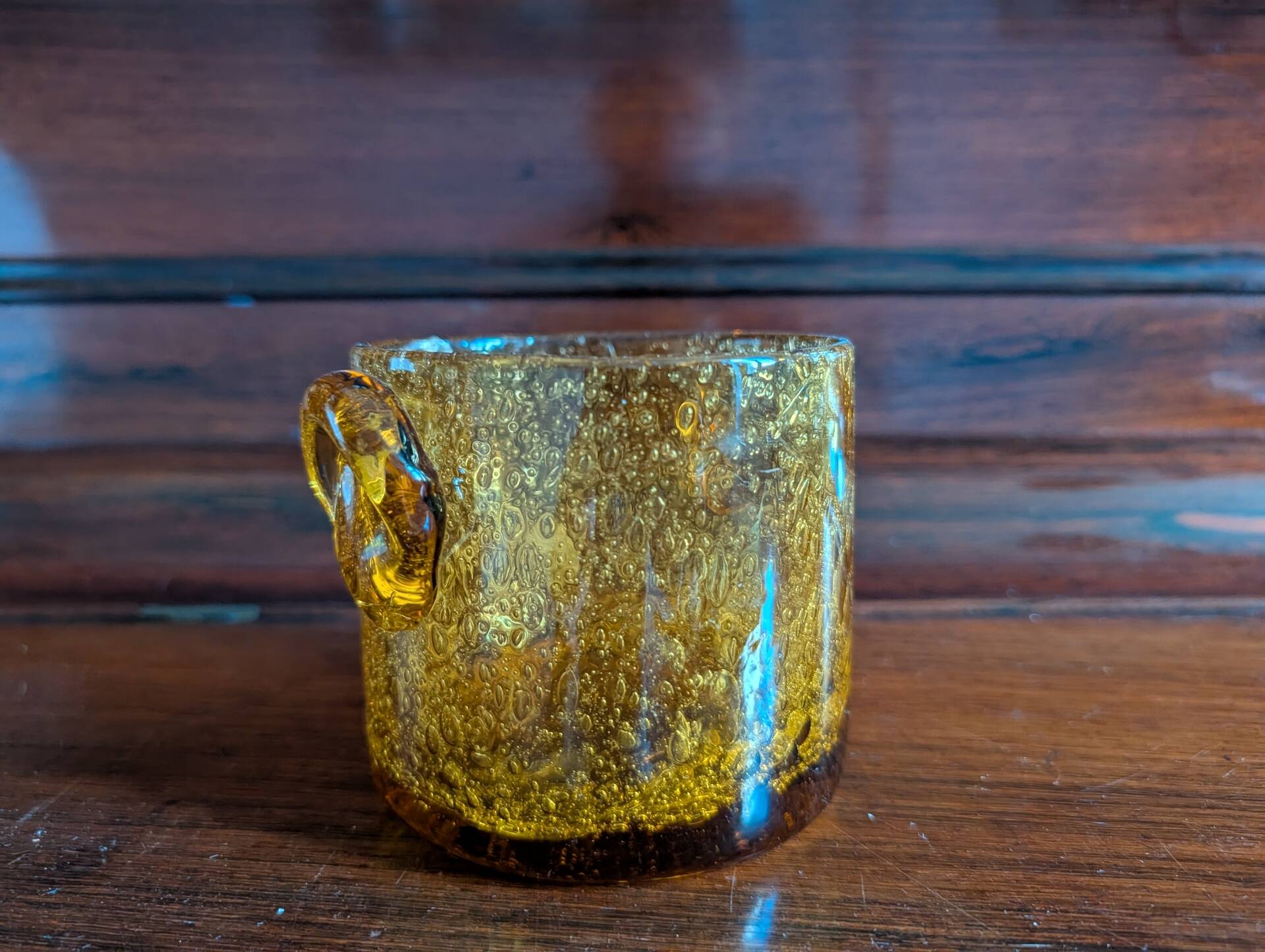 Small vase or amber bubbled glass tealight holder