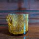 Small vase or amber bubbled glass tealight holder