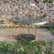 Round dining table with green marble and solid brass.