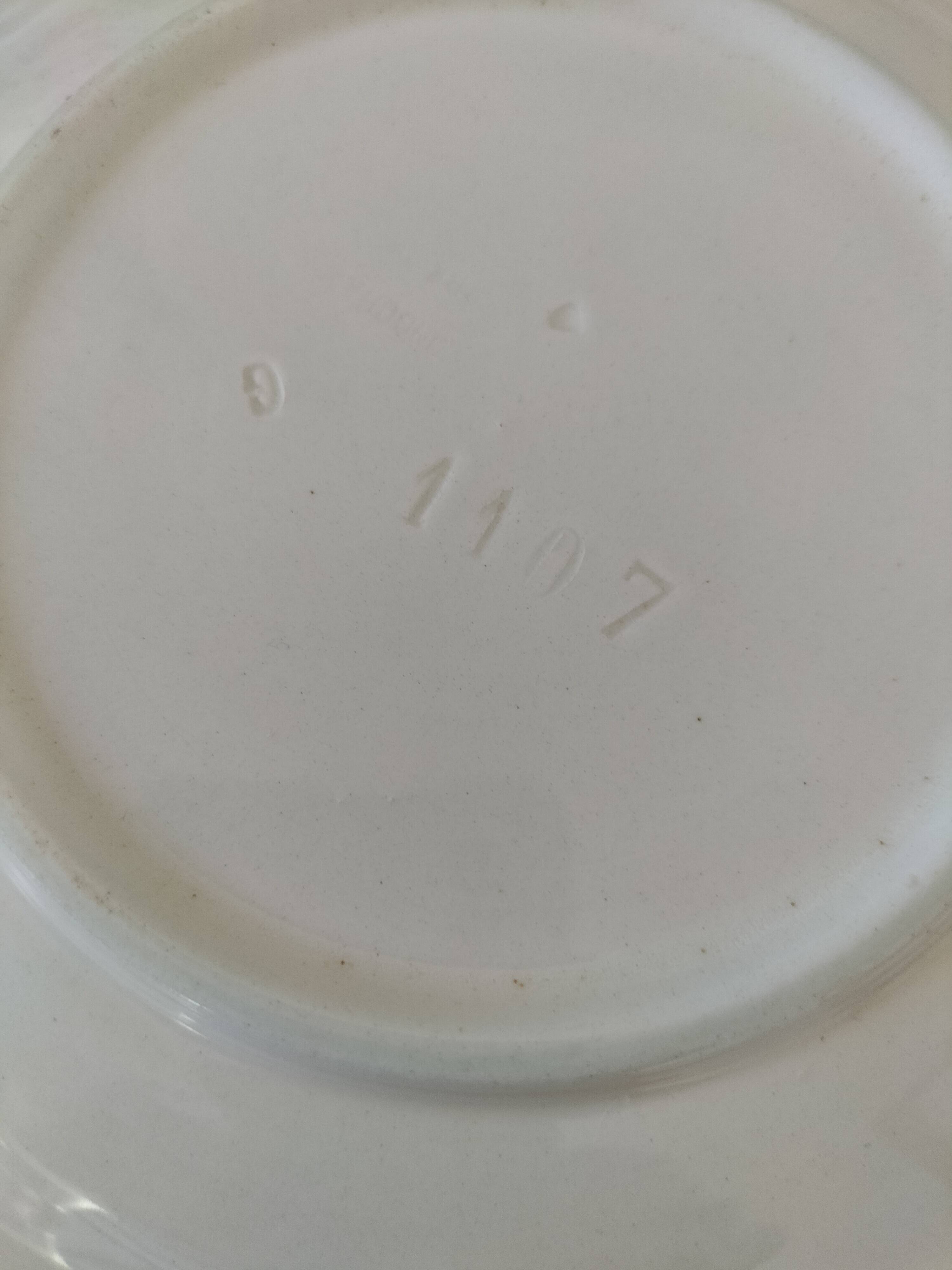 Two Longchamp earthenware plates.