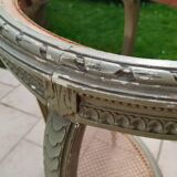 Old oval table with marble top, Louis XVI style