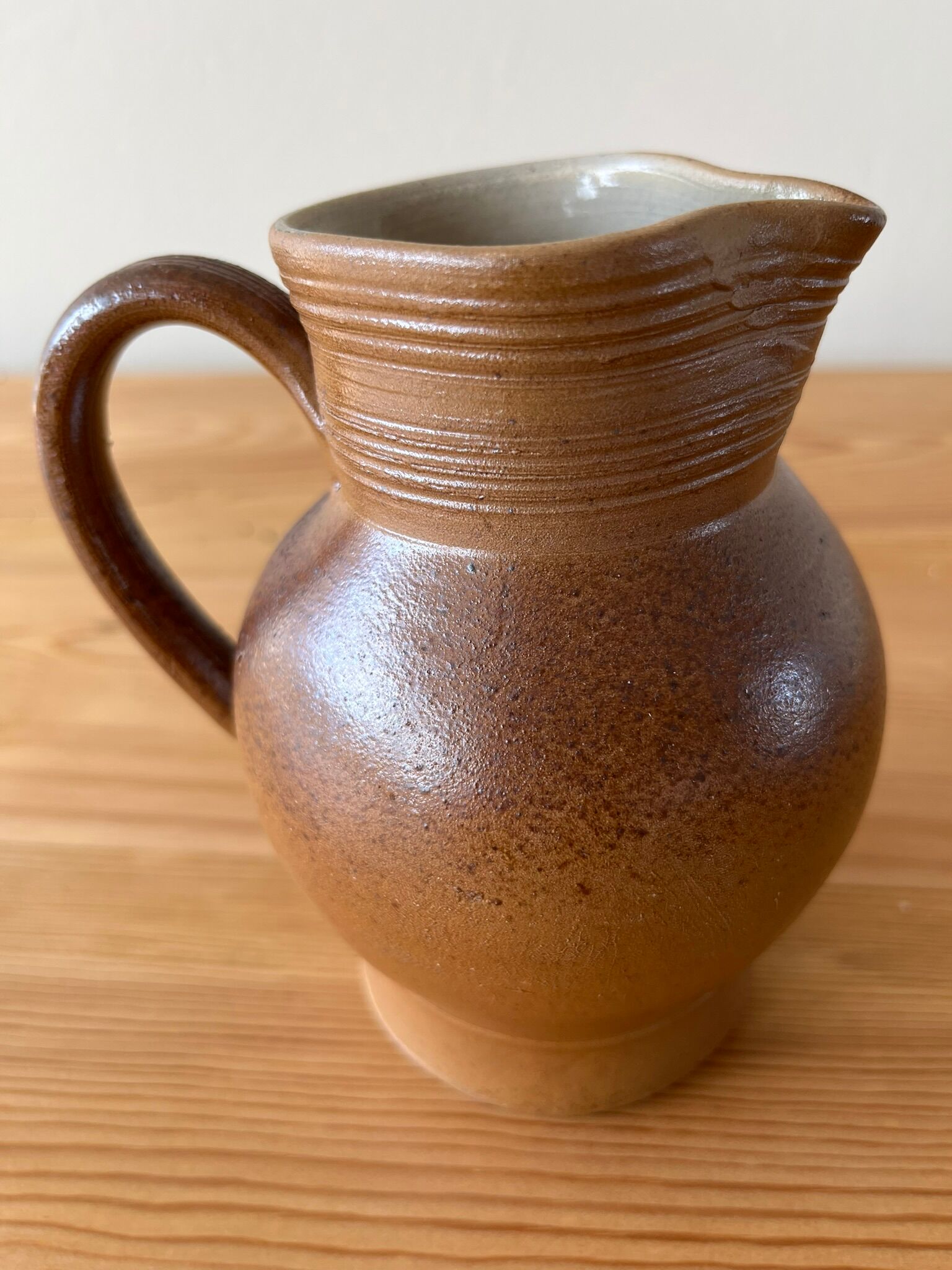 Pitcher in glazed sandstone