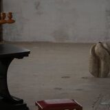 Danish sculpted oak stool from the mid-20th century with a red leather seat, 1950s.