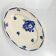 Oval half-porcelain plate from Badonviller, blue flower pattern, early 20th century.