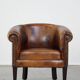 Sturdy, stately and subtle vintage sheepskin club chair