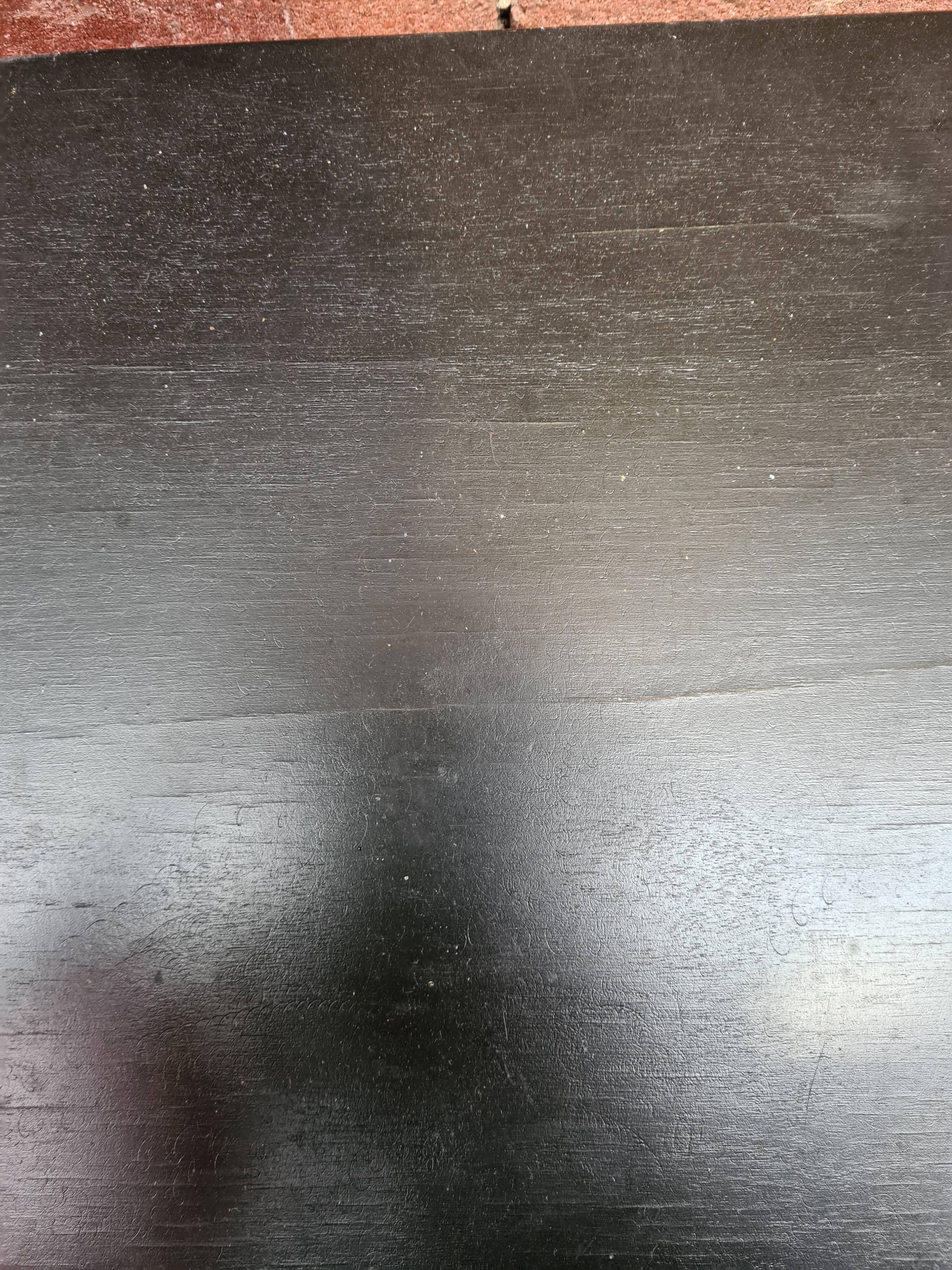 Vintage black wood trundle table