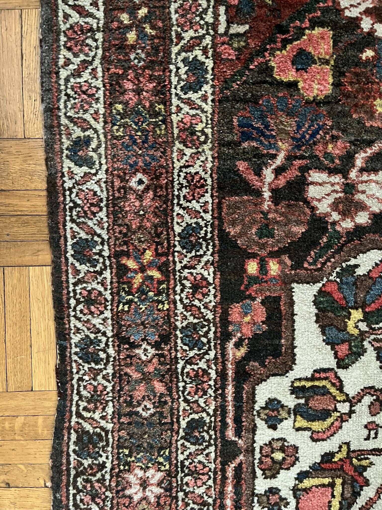 Antique handmade Hamadan Persian rug, ivory medallion on dark background 148x103.