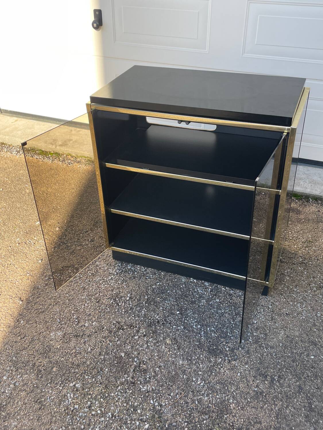 Vintage black and gold TV cabinet from the 70s/80s