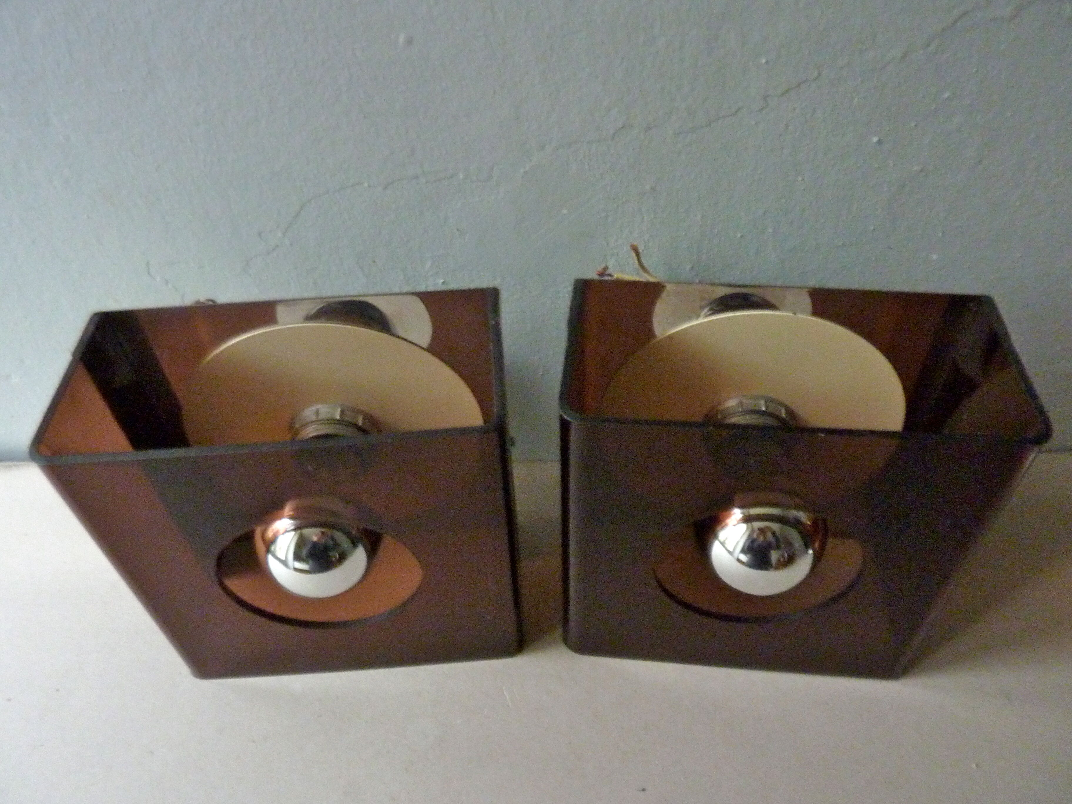 Pair of chromed metal and smoked plexiglass of the 1970s