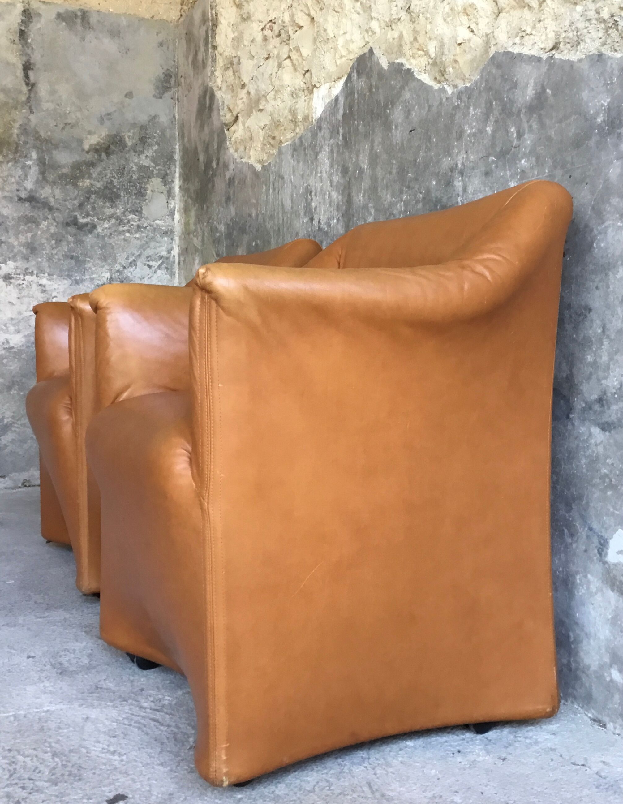 Pair of convertible armchairs in cognac leather - vintage 1970