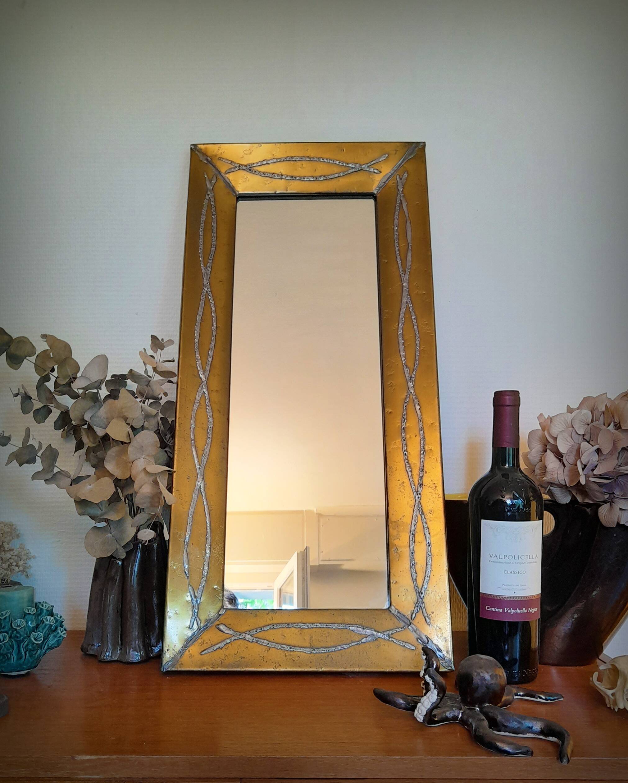 Brutalist brass mirror by Jean Goardere, France, 1970s