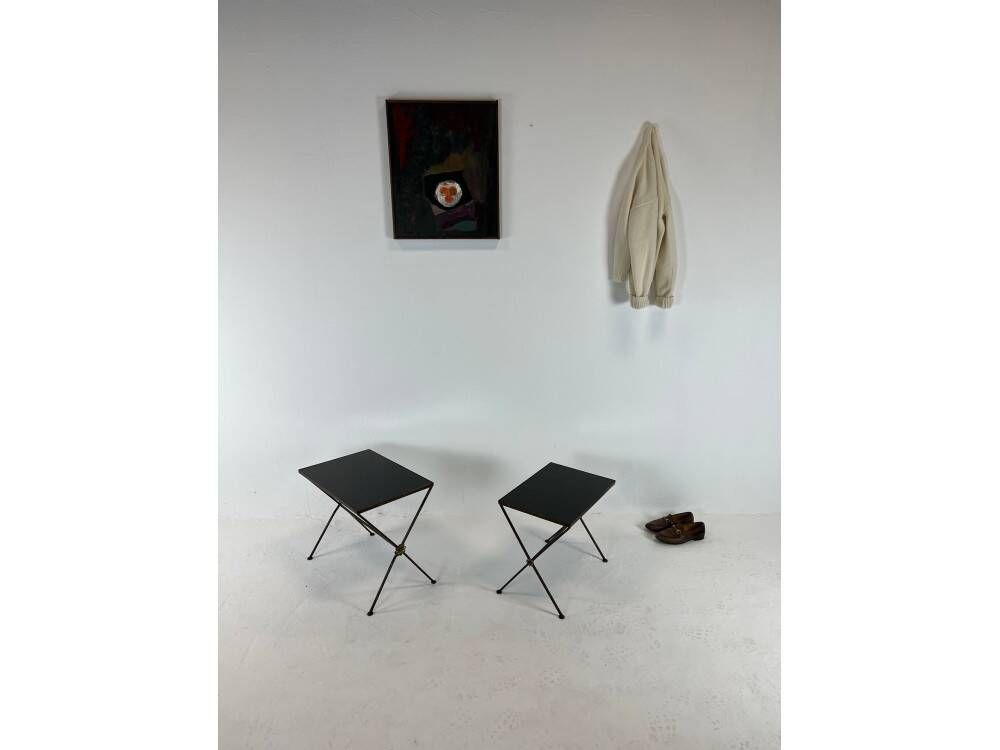 Modernist nesting tables in metal and black glass, 1950s.
