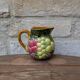 Small jug, milk pot in slipware with relief fruits Salins les Bains