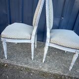 Pair of lacquered Louis XVI style chairs