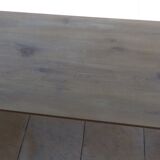 Large honey-colored farmhouse table in solid oak