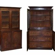 19th-century hardwood library with bronze metal doors and a chest of drawers.
