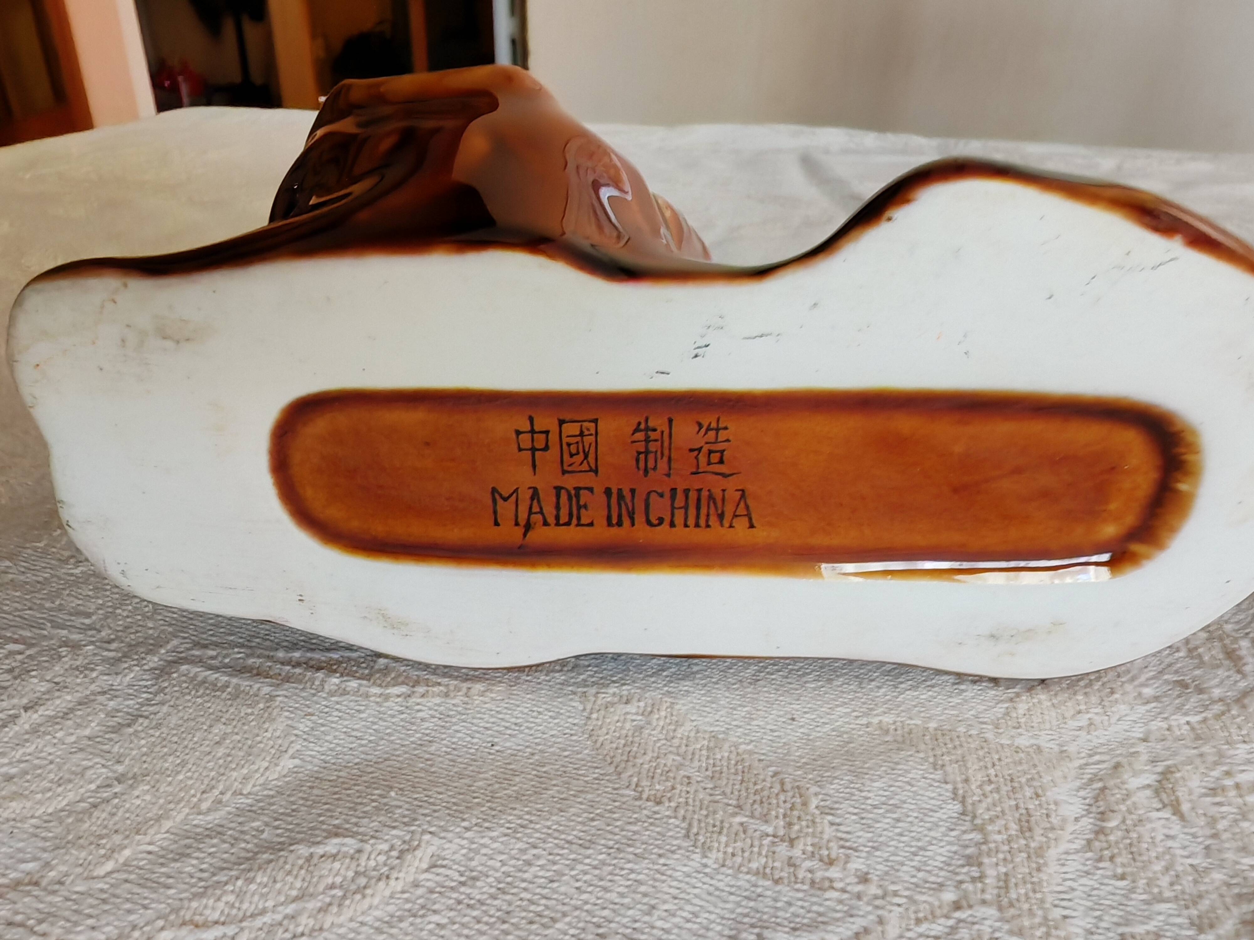 Pair of vintage lion ashtrays