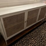 White wooden sideboard and canning