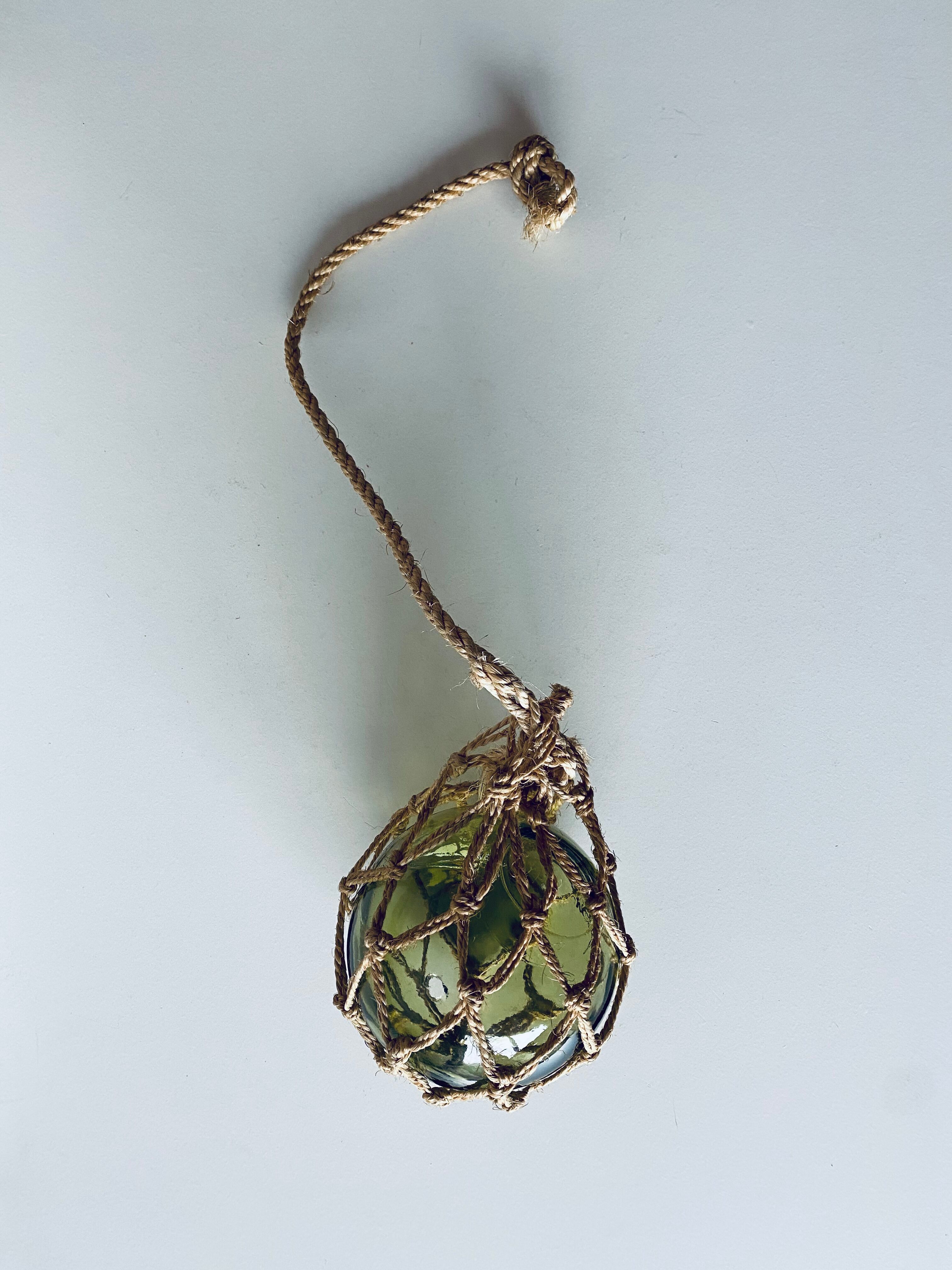 Old glass fishing float