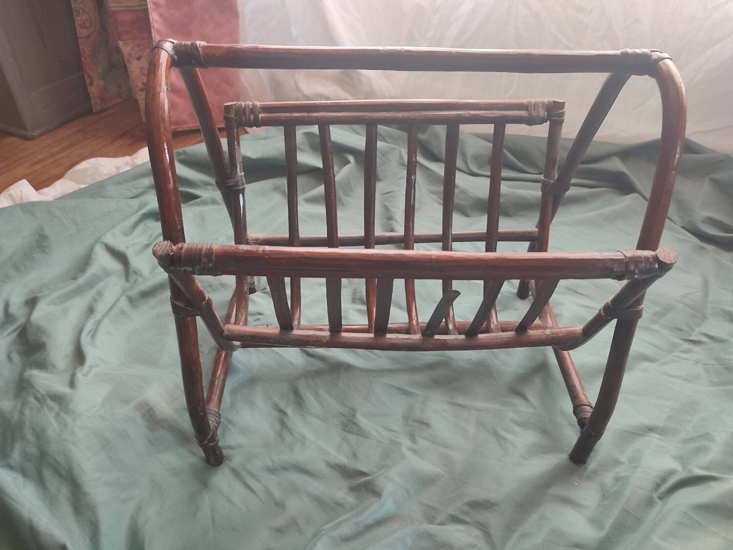 Dark rattan magazine rack