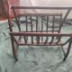 Dark rattan magazine rack
