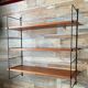 Vintage teak and metal shelf from the 60s
