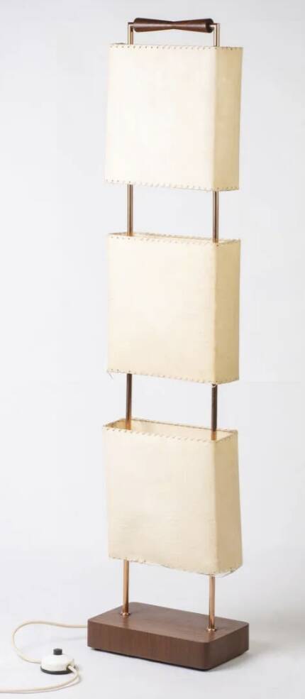 Wood and copper metal floor lamp with parchment.
