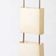 Wood and copper metal floor lamp with parchment.