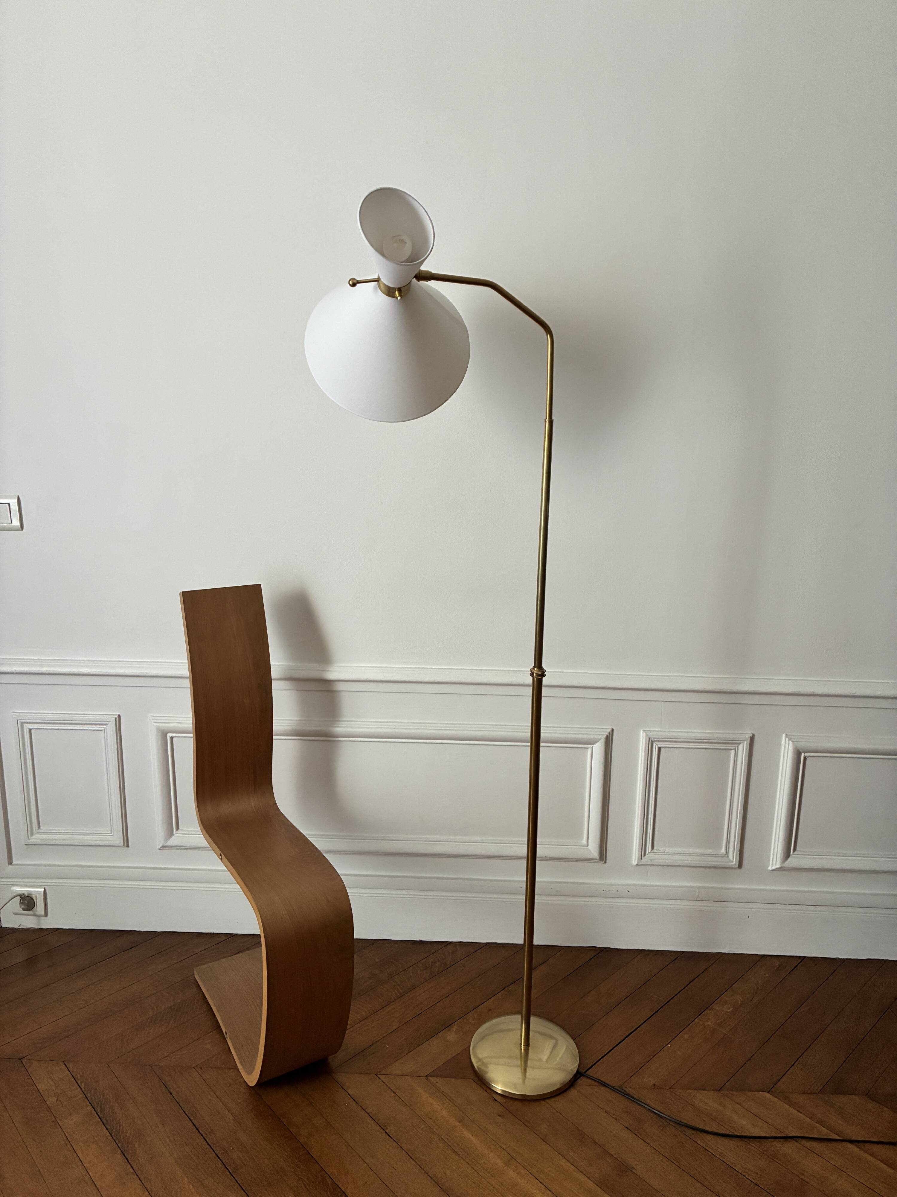 Adjustable Diabolo floor lamp in brass - 1950s