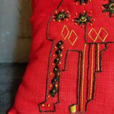 Vintage hand embroidered canvas cushion