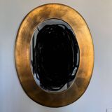 Gold oval mirror