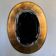 Gold oval mirror