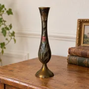 Vintage brass soliflore vase with black, red, and green floral decoration – H 18 cm