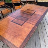 Rectangular dining table set and its suite of 6 armchairs in exotic wood and bamboo.